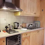 Kaloudis & Apartamento